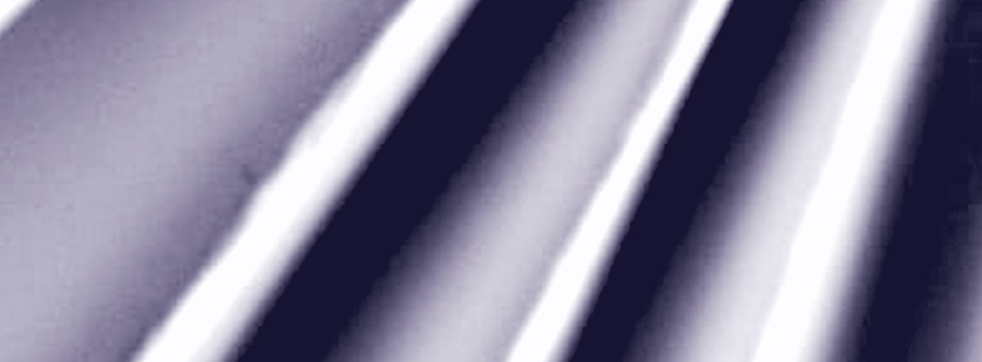 Light raking across a run of folds