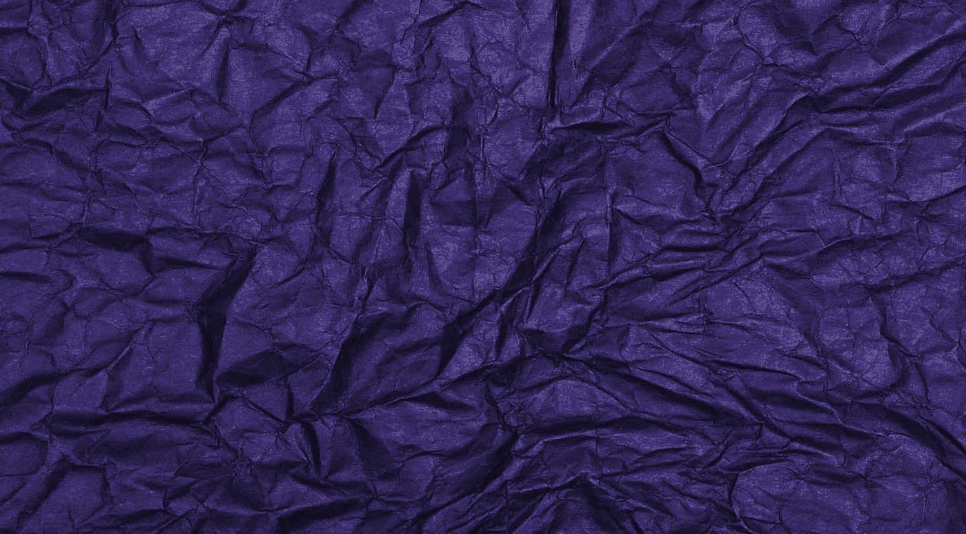 Deep violet crumpled paper, edge to edge