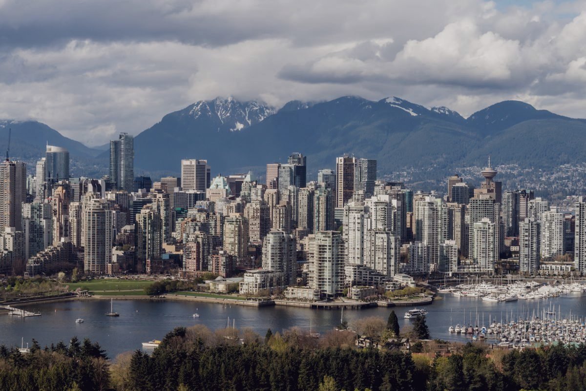 Vancouver towers at dusk, glass fronts holding the last of the light.